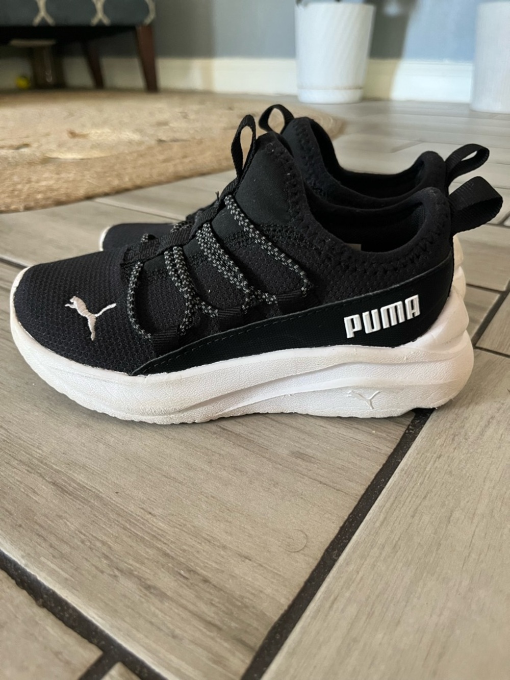 Puma Kids Black and White Slip-On Athletic Sneakers